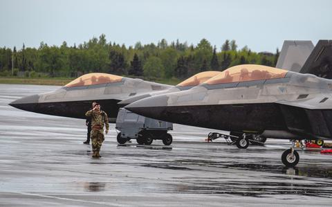 U.S. Air Force Staff Sgt. Isaiah Eyeland of the 90th Fighter Generation Squadron salutes an F-22 Raptor pilot June 3, 2025, in Alaska during Exercise Tropic Tundra, in preparation for Exercise Resolute Force Pacific.