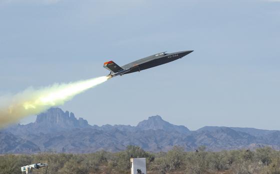 An XQ-58A Valkyrie unmanned airplane takes off from the U.S. Army Yuma Proving Ground in Arizona on Dec. 9, 2020. The Air Force recently announced that the Valkyrie drone was flown by artificial intelligence for the first time.  