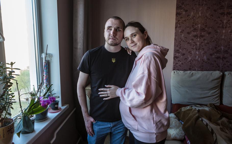 Ivan Soroka, 27, and his wife Vladyslava, 26, at their home in Kyiv on April 4, 2024, during Vladyslava’s ninth month of pregnancy.