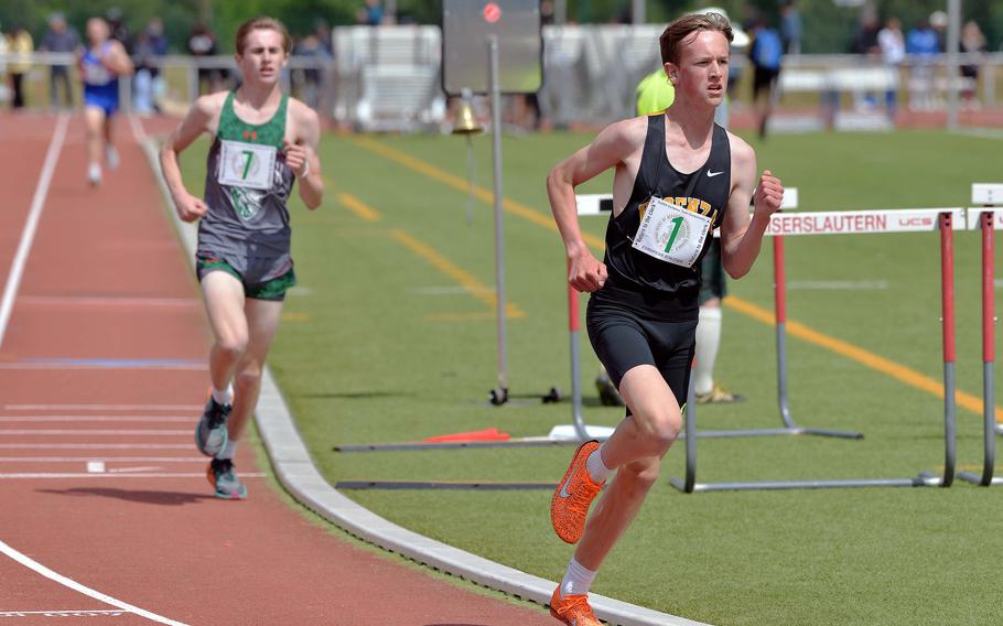 Vicenza’s Mitchell Horrigan heads into the final lap of the boys 3,200-meter race ahead of AFNORTH’s Logan Conrad. Horrigan won the event at the 2025 DODEA-Europe track and field finals in Kaiserslautern, Germany, in 9 minutes, 49.33 seconds.