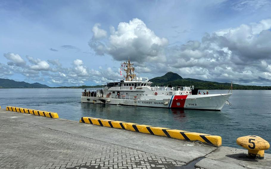 The U.S. Coast Guard cutter Frederick Hatch steams away from a pier in Tacloban, Philippines, Monday, Oct. 23, 2023. 