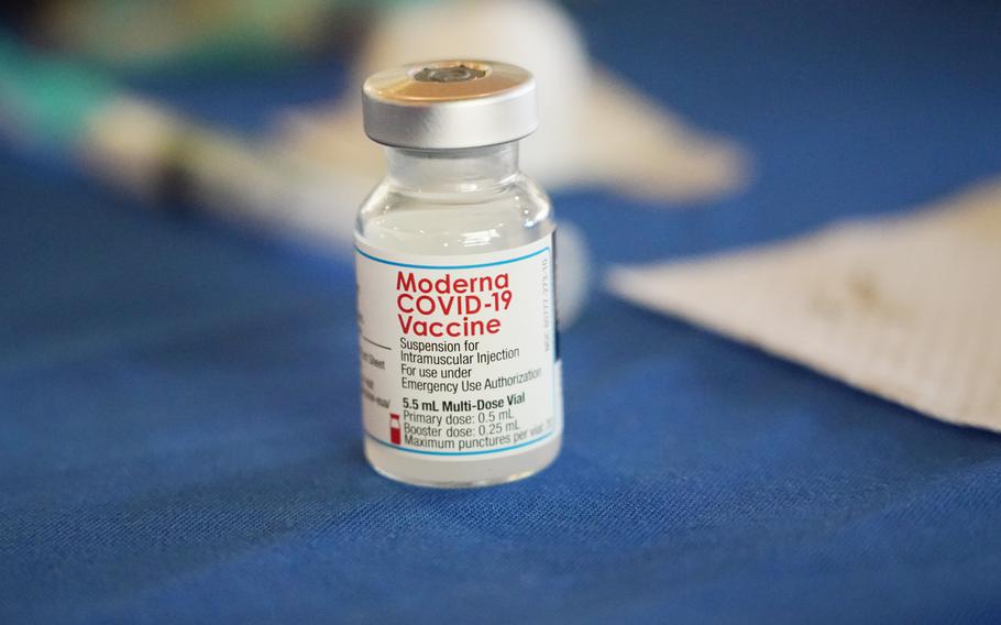 A photo of a vial of the covid vaccine.