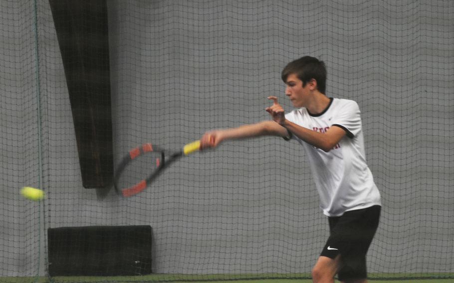 Alexander Brunk of Kaiserslautern uses a forehand shot in the boys doubles final at the DODEA-Europe tennis championships Saturday, Oct. 23, 2021.