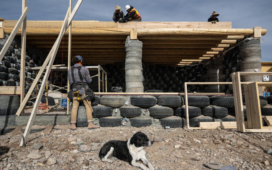 Construction of a new Earthship “Unity” model is seen in Taos, N.M, on December 8, 2021. 