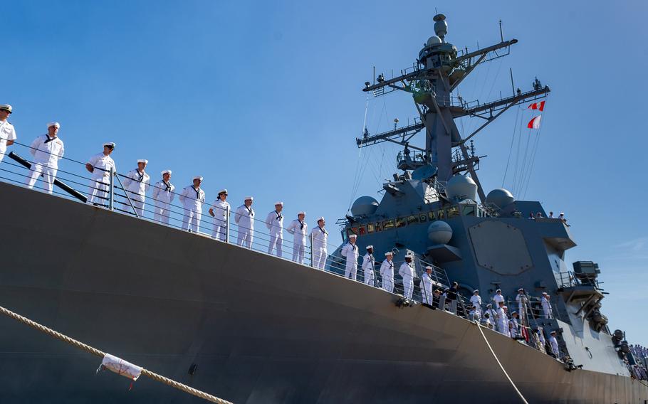 Crew members of the USS Thomas Hudner (DDG 116) line the rail of the Arleigh Burke-class guided-missile  destroyer as it returned to its homeport of Naval Station Mayport on Saturday morning after its maiden deployment. It supported operations in the 5th and 6th Fleet areas of responsibility.