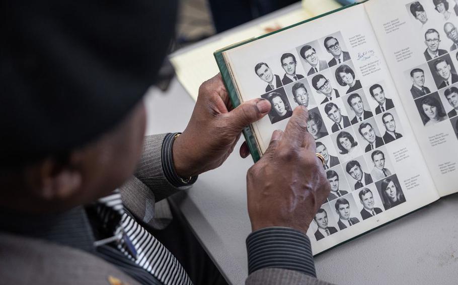 Bernard McClusky points to his 1966 class photo at Springfield Technical High School, before he went to Vietnam.