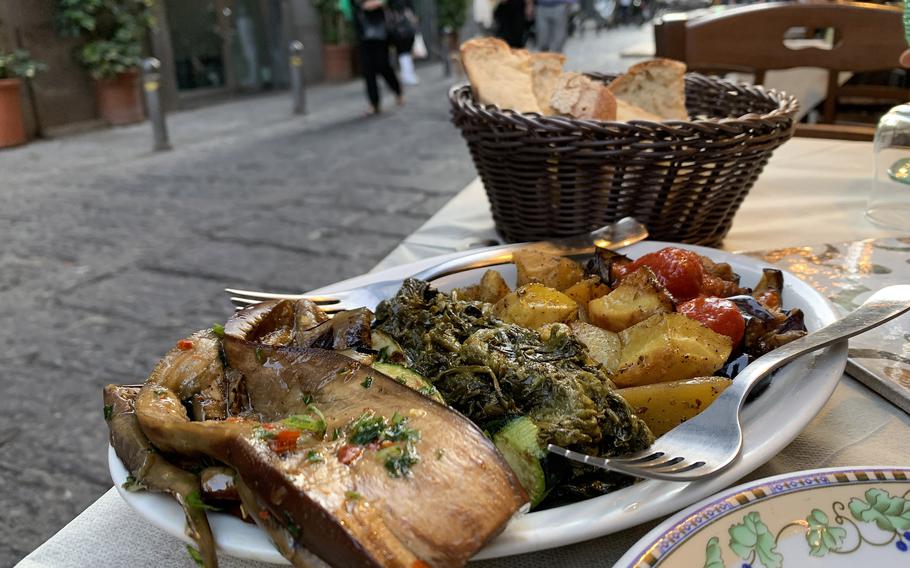 Contorni misti di stagione, or mixed side dishes, at Osteria da Tonino includes garlic roasted potatoes, two kinds of eggplant and grilled zucchini. Paired with a glass of Fiano di Avellino, the appetizer is enough for a light meal.