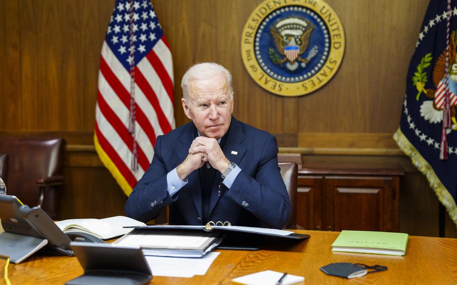 This image provided by The White House via Twitter shows President Joe Biden at Camp David, Md., Feb. 12, 2022. 