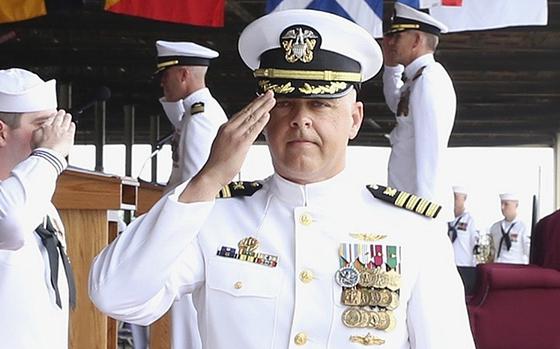 Capt. Trent Kalp salutes during a change of command ceremony at Naval Supply Systems Command Fleet Logistics Center Pearl Harbor, Hawaii, on June 26, 2019.