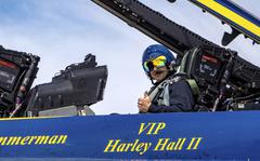 Harley Hall II, son of Vietnam veteran Harley H. Hall, sits in a F/A-18 Super Hornet jet waiting to fly with the Navy’s Blue Angels during a flight demonstration on March 17 , 2023.