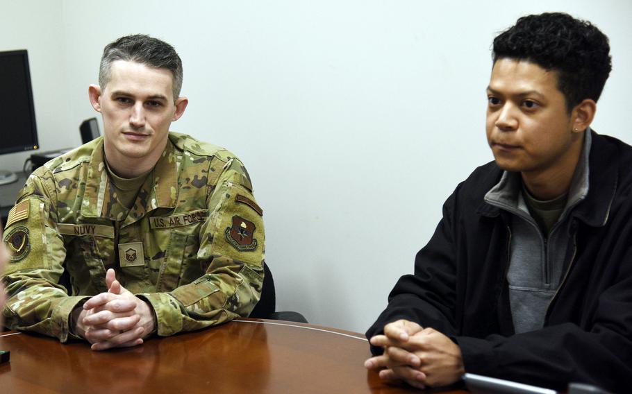 Master Sgt. Zackery Nuvy, a Japan-based Air and Space Force recruiter, speaks with Stars and Stripes alongside recruit Takao Elliot at Yokota Air Base, Japan, on April 15, 2024. 