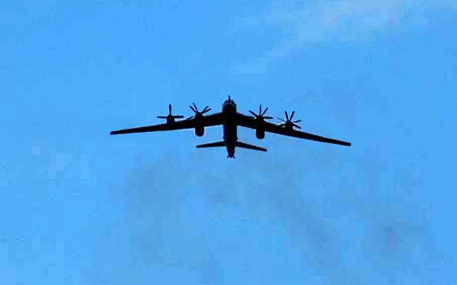 A Russian Tu-95 long-range bomber flies south of Japan on Feb. 9, 2008.