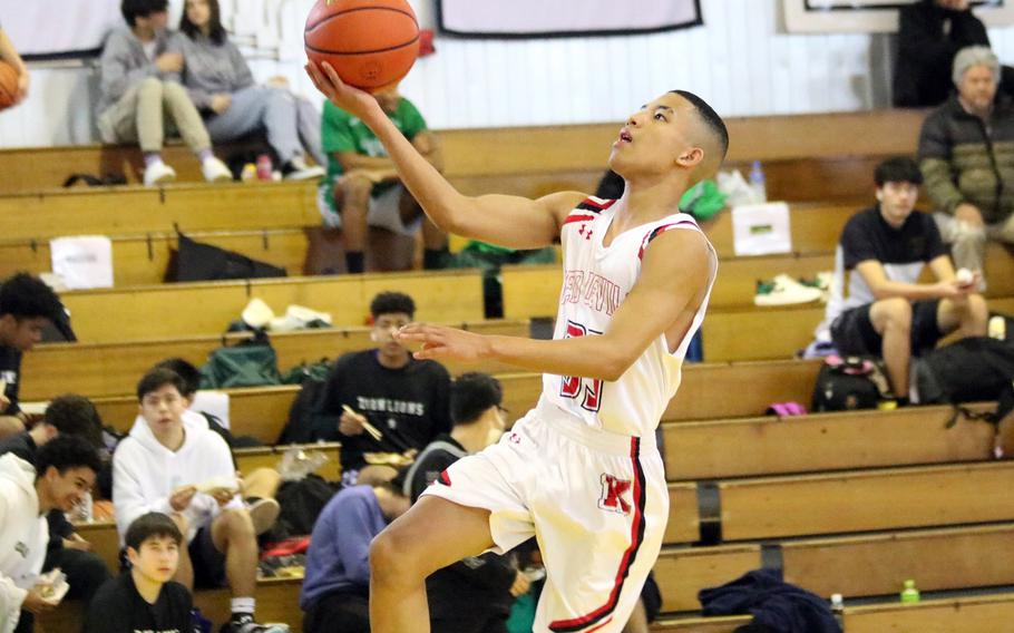 Nile C. Kinnick guard Vance Lewis averaged 16 points in the Red Devils' two pool-play games Monday in the Far East Boys Division I tournament. The Red Devils beat Okinawa Christian 57-35 and American School Bangkok 57-33.