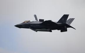 FILE - A United States Marine Corps F-35B Lightning II takes part in an aerial display during the Singapore Airshow 2022 at Changi Exhibition Centre in Singapore, Feb. 15, 2022. A Marine Corps pilot safely ejected from a fighter jet over South Carolina and the search for his missing aircraft was focused on two lakes near North Charleston. Military officials say the pilot parachuted safely into a North Charleston neighborhood Sunday Sept. 17, 2023. He was taken to a hospital and was in stable condition. The pilot's name has not been released. A search for the missing F-35 was focused on Lake Moultrie and Lake Marion, which are north of North Charleston. (AP Photo/Suhaimi Abdullah file)