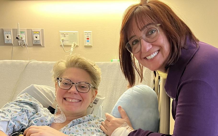 Molly Jones, in bed, and Kristi Hadfield after the transplant surgery. 