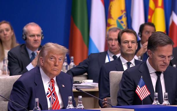 In this screenshot, President Donald Trump listens to NATO Secretary General Mark Rutte at the beginning of a meeting of the North Atlantic Council during the NATO summit in The Hague, Netherlands, June 25, 2025.