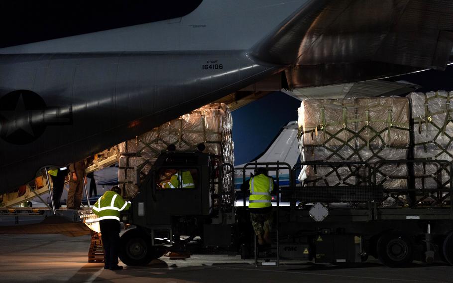 The Naval Support Activity Souda Bay, Crete, air cargo team and Navy air crewmen unload cargo from a C-130 aircraft on Feb. 12, 2023, as part of the joint U.S. military support of humanitarian assistance and disaster relief efforts, following the Feb. 6, 7.8 magnitude earthquake in Turkey.