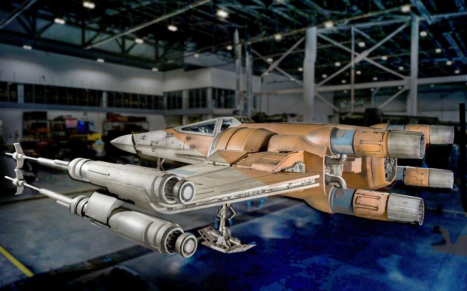 An X-wing starfighter used for “Star Wars: The Rise of Skywalker” in the Air and Space Museum’s Restoration Hangar at the Udvar-Hazy Center.