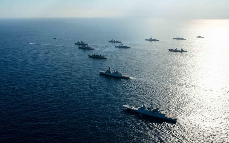Standing NATO Maritime Group 2 ships and submarines sail in formation during the Dynamic Manta exercise in the Ionian Sea off the coast of Sicily, Feb. 21, 2022. U.S. involvement is limited this year amid the Russian advance toward Ukraine. Ships, submarines and aircraft from nine allied nations will practice anti-submarine and anti-surface warfare skills until March 4.