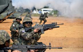 South Korean troops form a line during an amphibious assault on Hat Yao Beach, Thailand, March 1, 2024, as part of the Cobra Gold exercise.