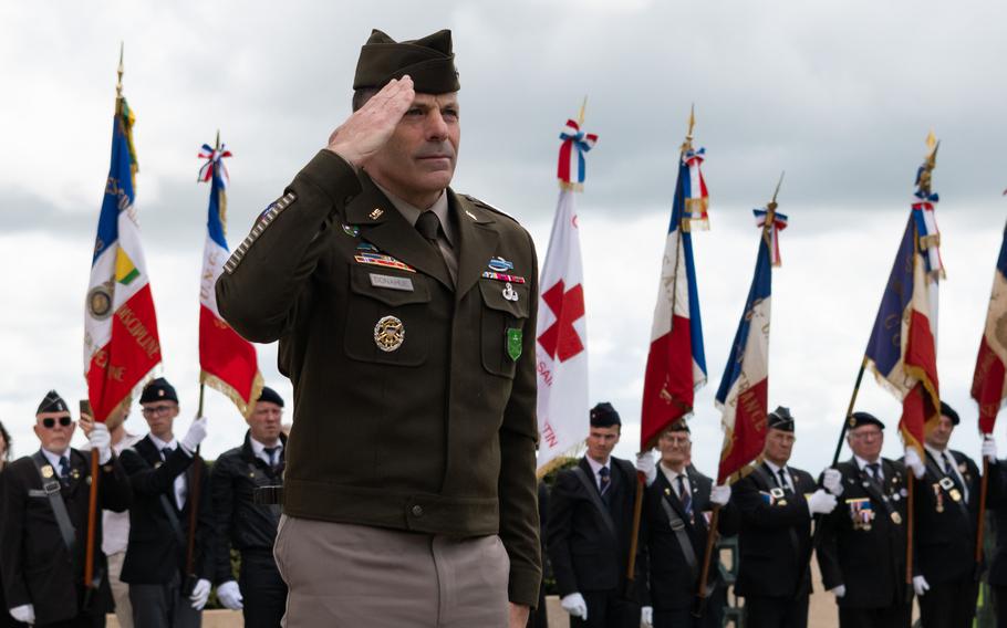 Gen. Christopher T. Donahue salutes
