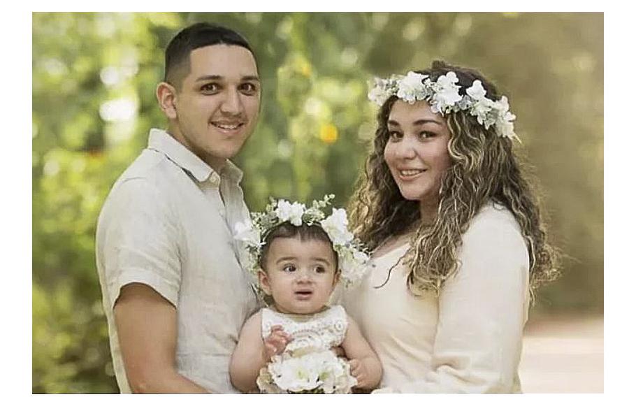 Marine veteran Gabriel Jesus Torres, his wife and their daughter.