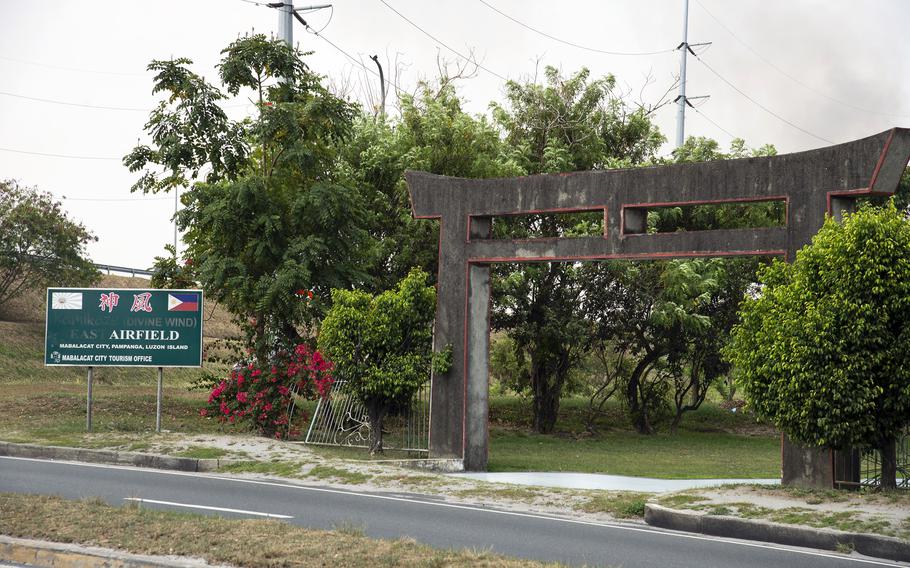 This roadside memorial near Clark Air Base in the Philippines reminds visitors that Japanese pilots on suicide missions took off nearby from “the very first Japanese Kamikaze Airfield.”