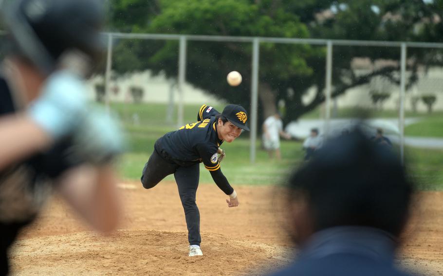 Ty Lugan pitches.