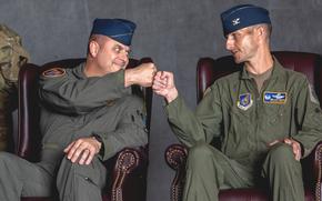 Col. Jesse J. Friedel, left, 35th Fighter Wing outgoing commander, congratulates Col. Michael P. Richard, the incoming commander, during the change of command ceremony at Misawa Air Base, Japan, on June 30, 2022. Friedel was subsequently promoted to brigadier general.
