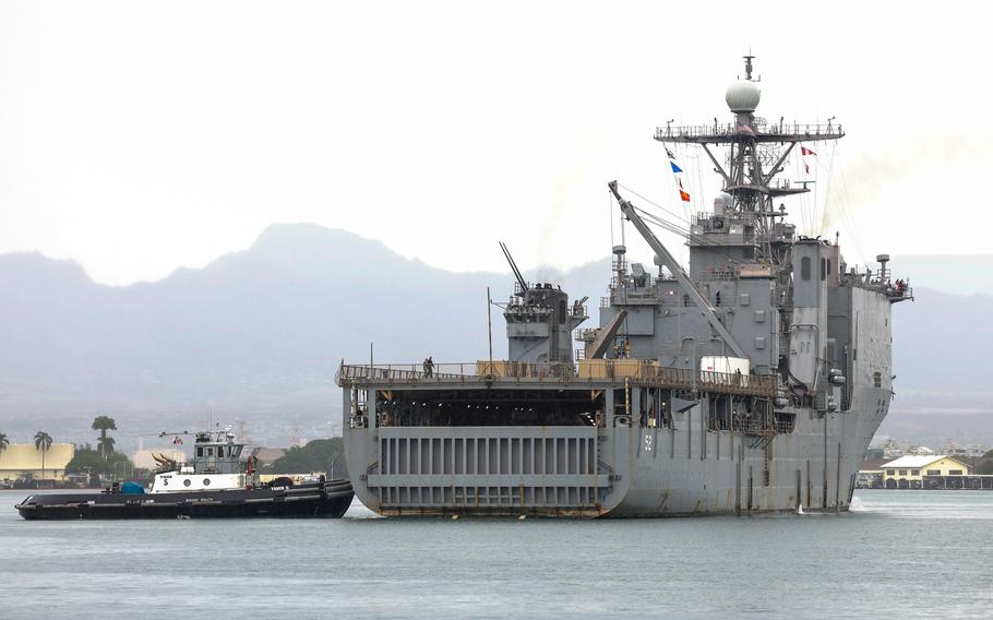 Harpers Ferry-class dock landing ship USS Pearl Harbor (LSD 52) pulls into Joint Base Pearl Harbor Hickam after completing Pacific Partnership 2023, Friday, Dec. 1, 2023.