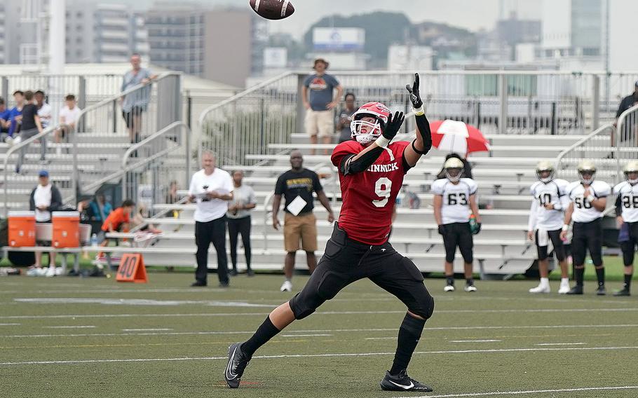 Nile C. Kinnick receiver Khalil Buscher awaits a pass.