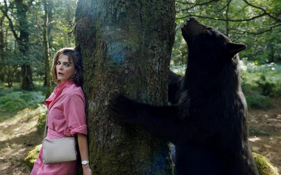 Keri Russell in a scene from “Cocaine Bear,” a film directed by Elizabeth Banks and very loosely based off a 1985 news story of a bear that died after ingesting a stash of cocaine.