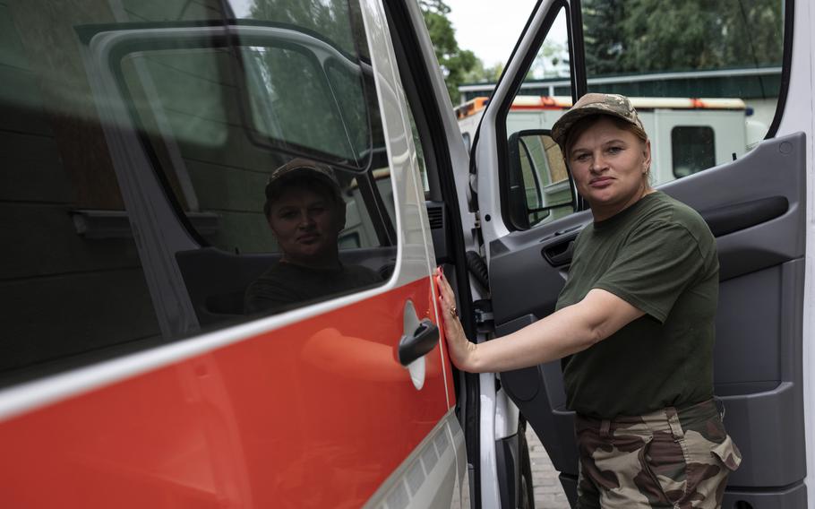 Irina Pukas, a 13-year veteran of the Army Medical Corps as she waits to be deployed outside a hospital in Kramatorsk, Ukraine on June 30, 2022. Pukas said she has honed a blend of maternal care and combat cred to be a more effective medic to soldiers who are often younger than her own grown sons.
