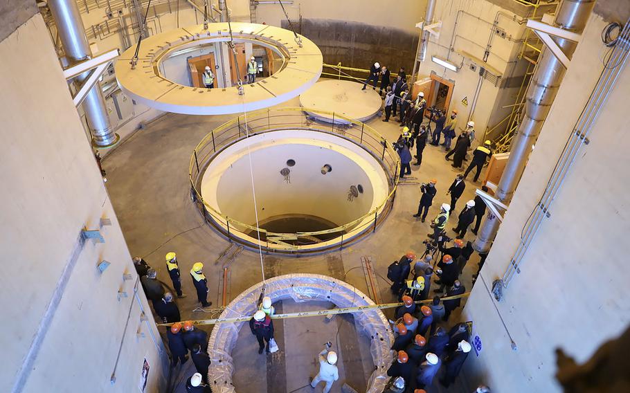 In this photo released by the Atomic Energy Organization of Iran, technicians work at the Arak heavy water reactor’s secondary circuit, as officials and media visit the site, near Arak, 150 miles southwest of the capital Tehran, Iran, Dec. 23, 2019.