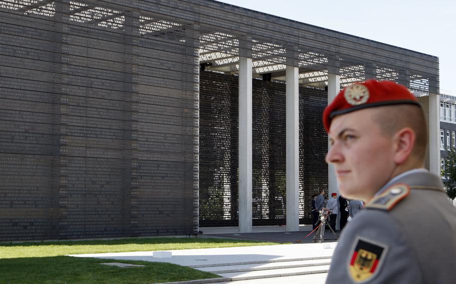 A soldier is seen in front of the Military Memorial of the German Bundeswehr in Berlin, Tuesday, Sept. 8, 2009. 