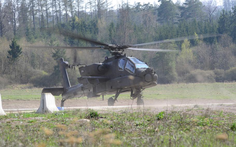 An AH-64D Apache Longbow helicopter prepares for refueling operations during a training exercise at the Oberdachstetten Local Training Area, Ansbach, Germany, in 2013. 