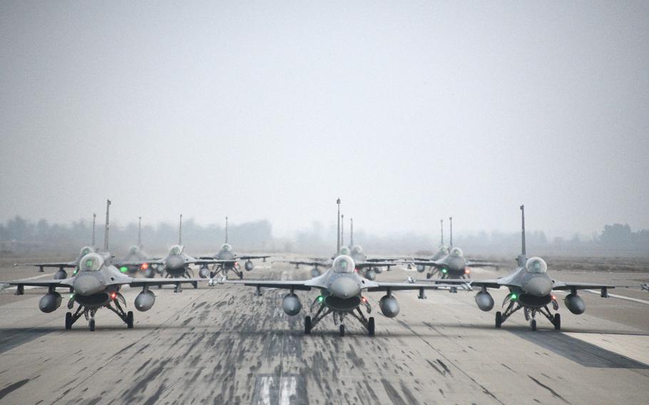 The Iraqi air force performs an F-16 ''elephant walk'' on Balad Air Base, Iraq, in December 2020. Three rockets hit the base Wednesday, the military said.
