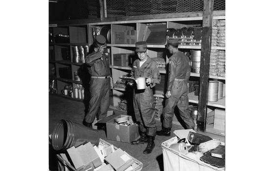 Yongdong-po, South Korea, Oct. 1958: MSgt. William J. Ward of the 13th Quartermaster Battalion holds a coffee pot and a clip board as he checks the inventory. Everything from map tacks to kitchen stock pots are "on sale" at the new Quartermaster Self-Service Supply Center opened  at Yongdong-po. The center - which looks like a stateside supermarket and is operated by the 13th Quartermaster Battalion - services all units in the Seoul, Inchon and Ascom area. 

Looking for Stars and Stripes’ historic coverage? Subscribe to Stars and Stripes’ historic newspaper archive! We have digitized our 1948-1999 European and Pacific editions, as well as several of our WWII editions and made them available online through https://starsandstripes.newspaperarchive.com/

META TAGS: Pacific; South Korea; Yeongdeungpo; military supplies; military life; servicemember; logistics; U.S. Army; shelves