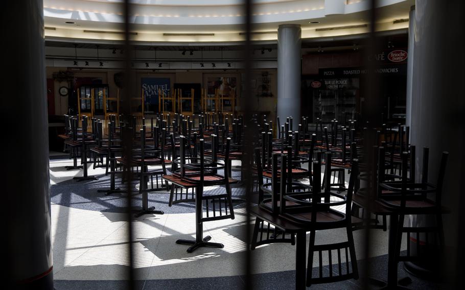 Chairs rest on tables in a food court at O’Hare International Airport in Chicago on June 13, 2020.