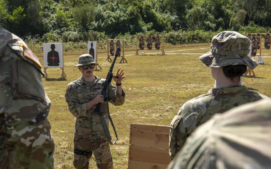U.S. Army Sgt. Nate Turgeon, a Massachusetts National Guardsman with the 772nd Military Police Company, gives instruction on range safety during Justified Accord 2024 (JA24) at the Counter Insurgency Terrorism and Stability Operations Training Centre, Nanyuki, Kenya, Wednesday, Feb. 28, 2024.