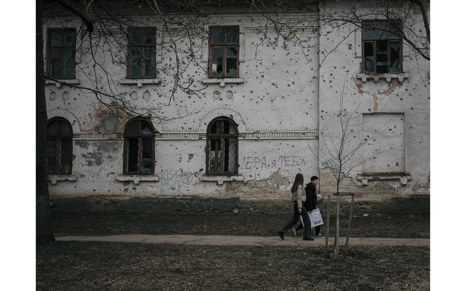 A building scarred by artillery fire in Bender, Transnistria, is among the remaining traces of a war in the early 1990s. 