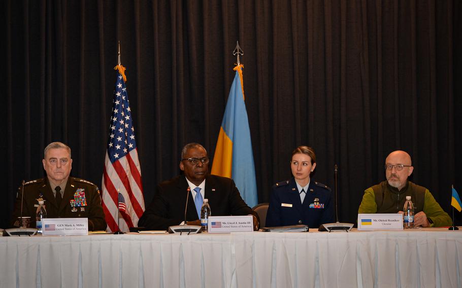 At front, U.S. Army Gen. Mark A. Milley, the chairman of the Joint Chiefs of Staff, U.S. Defense Secretary Lloyd J. Austin III and Ukrainian Defense Minister Oleksiy Reznikov attend the Ukrainian Defense Consultative Group at Ramstein Air Base, Germany, April 26, 2022. More than 40 nations gathered at the base to discuss security issues. Ramstein will host another consultative group meeting Sept. 8. 