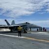 Sailors aboard the aircraft carrier USS Gerald R. Ford ready an F/A-18 Super Hornet for takeoff in the Ionian Sea on July 29, 2025. The Gerald R. Ford Carrier Strike Group is deployed to the U.S. 6th Fleet area of operations.