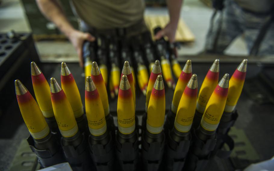 A munitions technician with the 1st Special Operations Maintenance Squadron inspects 30mm rounds at Hurlburt Field, Fla., Feb. 6, 2018.