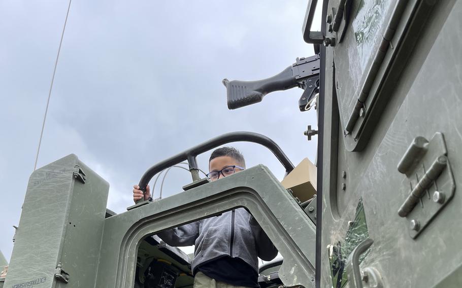 Rafael Salazar, 7, the son of Sgt. Monica Salazar, a soldier with the 41st Field Artillery Brigade, experiences an M270 Multiple Launch Rocket System at Grafenwoehr Training Area on Aug. 5, 2021. The 41st FAB hosted a family day during a live-fire training exercise.