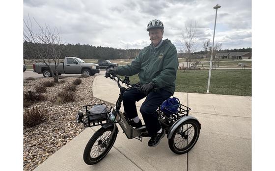 Ed McLaughlin, 96, on his e-tricycle, which he rides every day for about 7 miles. MUST CREDIT: Good Samaritan Society-St. Martin Village