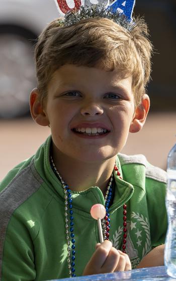 A Polish child strikes a pose during the inaugural Polish-American Freedom Fest, held at Powidz Lake, Poland, July 4, 2024. 