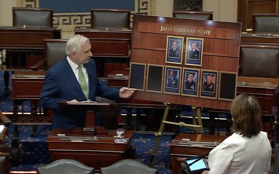 In this screenshot, Sen. Jack Reed, D-R.I., chairman of the Senate Armed Services Committee, points to empty positions on the Joint Chiefs of Staff during a speech on the Senate floor, Wednesday, Sept. 6, 2023. 