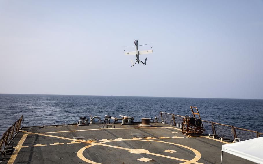 A Flexrotor long-range robotic aircraft launches from the flight deck of the guided-missile destroyer USS McFaul during flight operations in the Gulf of Oman on July 23, 2023. 