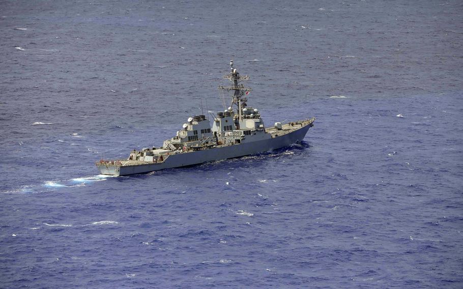 The guided missile destroyer USS Higgins sails in the Philippine Sea March 4, 2022.